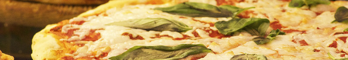 Eating Italian Pizza at Valentino's restaurant in Queens, NY.
